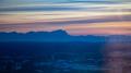 Panorama-Lounge im 26. Stock mit fantastischer Aussicht: München mit Sonnenuntergang und Alpenpanorama.